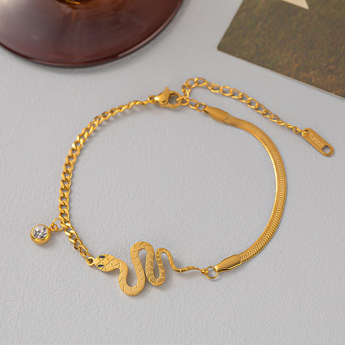 Schlichter Schlangen-Stil, vergoldete Armbänder, Ohrringe und Halskette aus Titanstahl