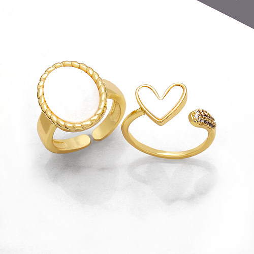 Estilo simples streetwear forma de coração oval revestimento de cobre incrustado concha 18K anéis abertos banhados a ouro