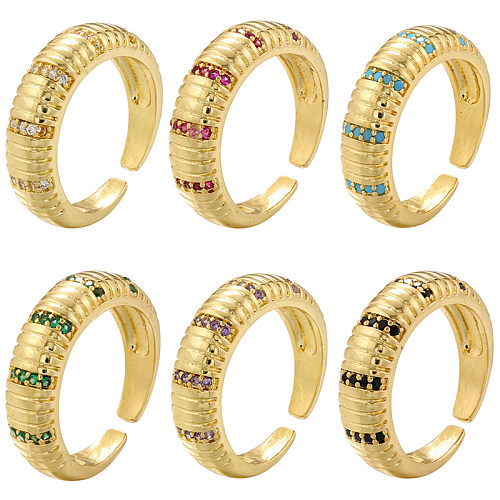 Elegante, runde, streifenförmige, verkupferte, eingelegte Zirkon-Ringe mit 18-Karat-Vergoldung