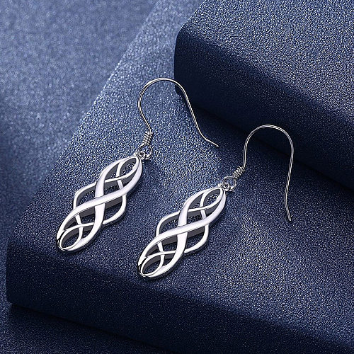 1 Paar elegante, unregelmäßige, aushöhlende Kupfer-Ohrringe für Damen