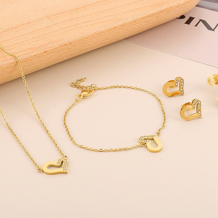 Lässige Streetwear-Ohrringe in Herzform mit 18 Karat vergoldeter Titanstahlbeschichtung