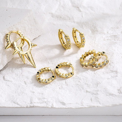 Neue Mode-Ohrringe mit geometrischer Beschichtung aus Gold und Mikro-Intarsien aus Zirkon und Kupfer