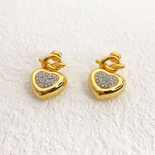 1 par de pendientes chapados en oro de 18 quilates con incrustaciones de piedras preciosas artificiales de cobre con forma de corazón para mujer