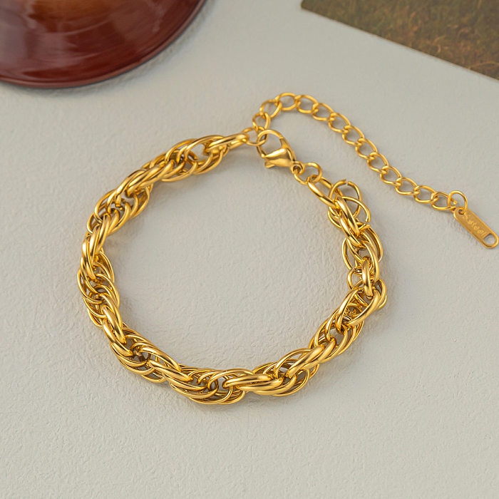 Glamouröse Halskette mit geometrischem Titanstahlüberzug und 18 Karat vergoldetem Armband