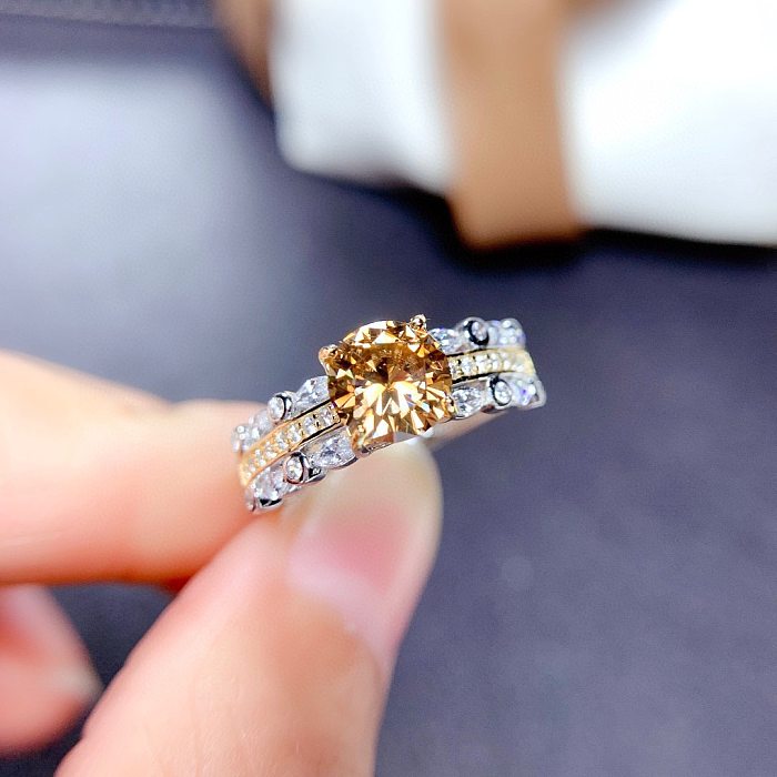 As pedras preciosas artificiais do embutimento geométrico de cobre do estilo clássico abrem anéis