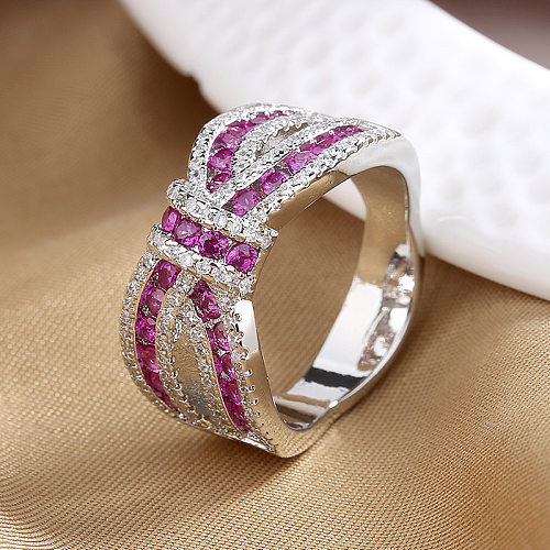 Luxuosos anéis de zircão com incrustações de cobre com nó de arco