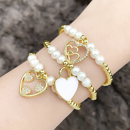 Fashion Simple Style Heart Shape Imitation Pearl Copper Charm Plating Inlay Shell Zircon Bracelets