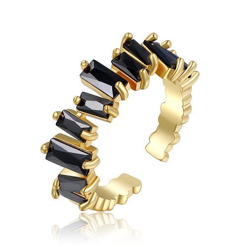 Europäischer und amerikanischer unregelmäßiger rechteckiger Zirkon-offener, verkupferter Ring aus echtem Gold