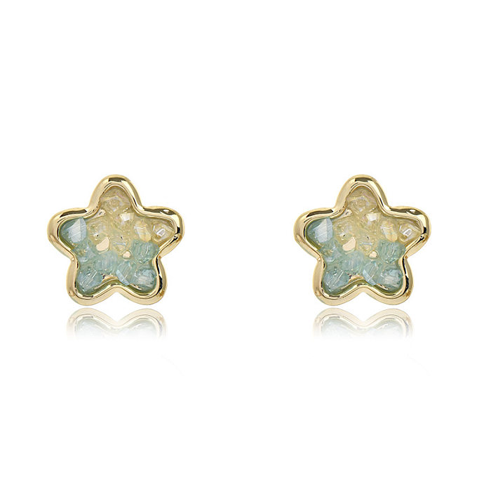 1 paire de clous d'oreilles en cristal de cuivre avec incrustation d'étoiles de style simple