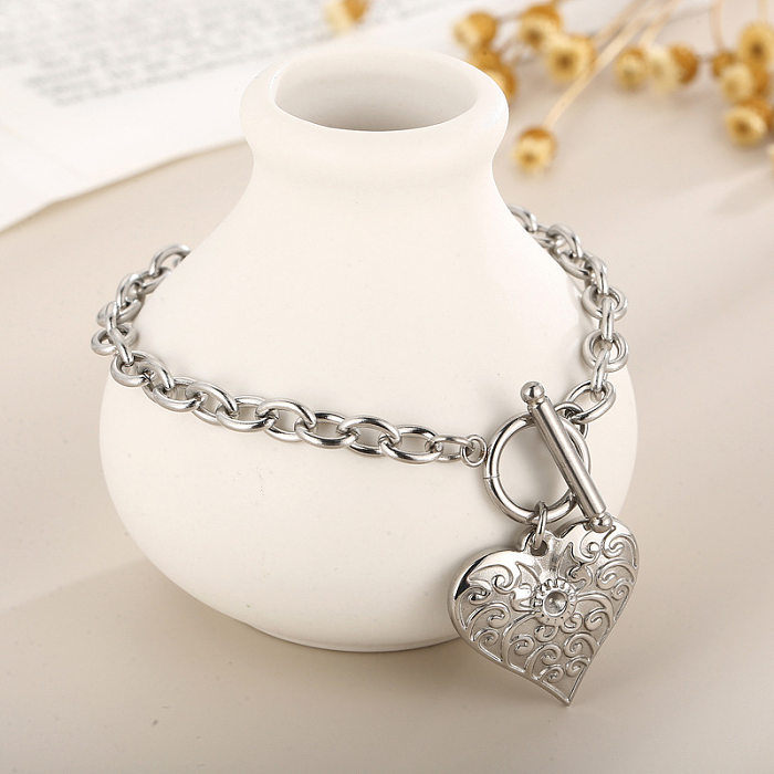Collier de bracelets de placage en acier titane en forme de coeur de mode