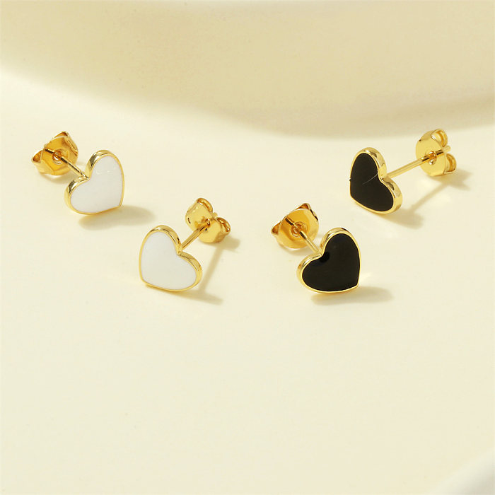 زوج واحد من أقراط الأذن المطلية بالنحاس والذهب عيار 1 قيراط بتصميم بسيط على شكل قلب