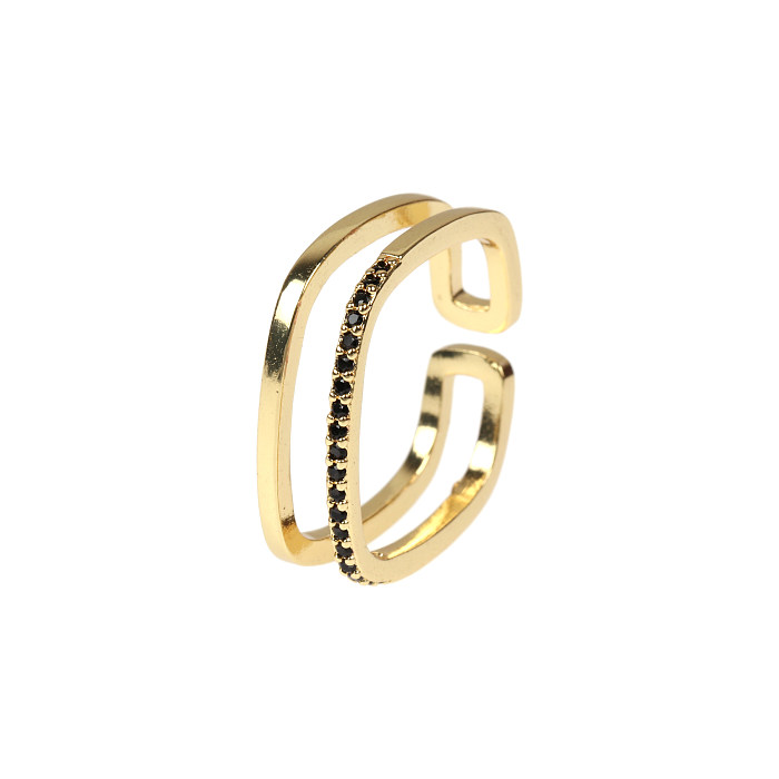 Schlichter, einfarbiger, vergoldeter offener Ring mit Zirkon-Intarsienverkupferung