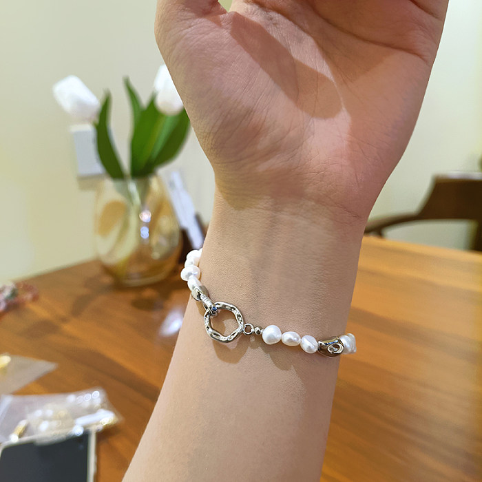 Collier de bracelets de placage de cuivre de perles d'eau douce rondes de style baroque