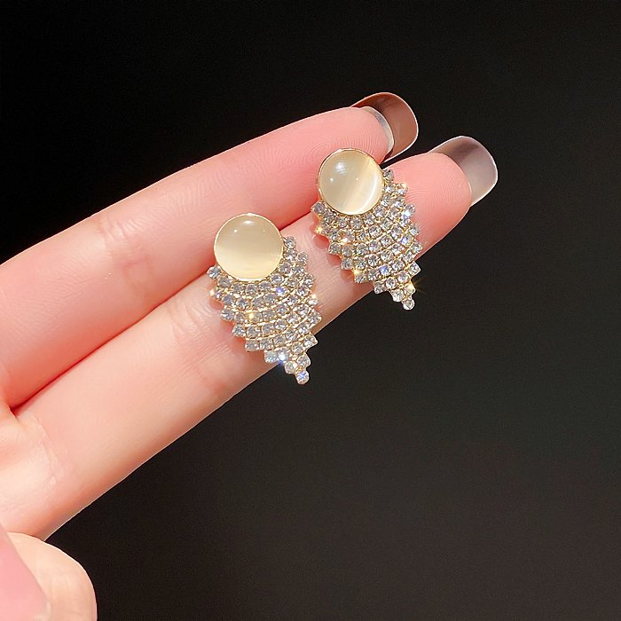 1 paire de boucles d'oreilles pendantes plaquées or 14 carats, Style Simple, incrustation ovale brillante, strass en cuivre opale