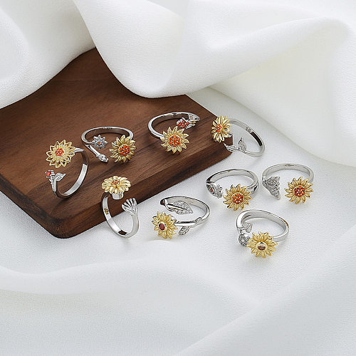 Anéis de zircão com incrustações de cobre e girassol em folha da moda