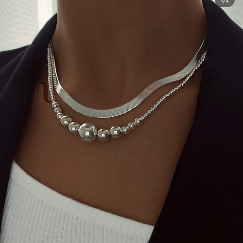 IG Style Halskette im klassischen Stil mit geometrischer Verkupferung