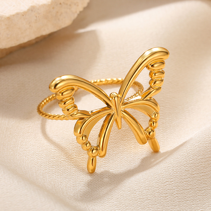 Gros doux Style Simple papillon placage en acier inoxydable évider anneaux plaqués or 18 carats