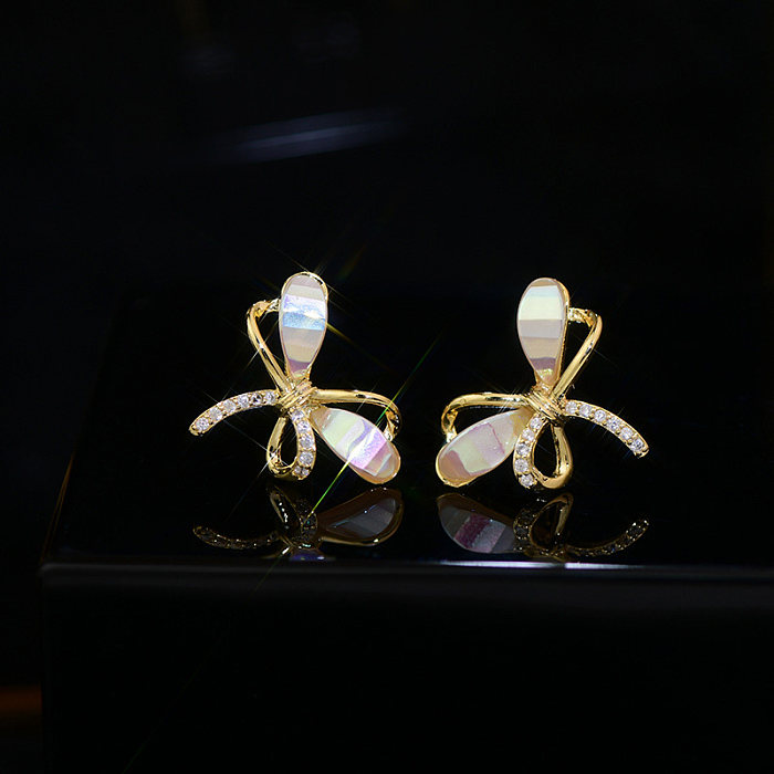 1 Paar niedliche Ohrstecker im französischen Stil mit süßer Schleife und Knotenüberzug, Inlay aus Kupfer, Zirkon, 14 Karat vergoldet