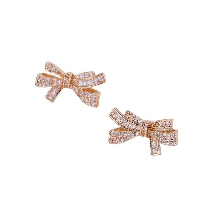 1 paire de clous d'oreilles en cuivre et strass, Style Simple, incrustation de nœud papillon