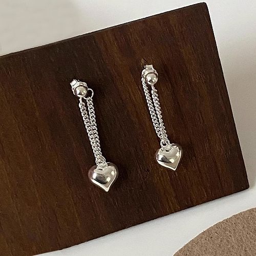 1 paire de boucles d'oreilles pendantes en cuivre plaqué en forme de cœur