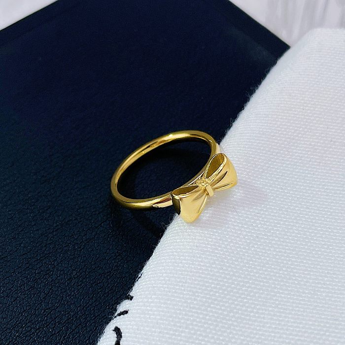 Atacado elegante básico streetwear arco nó de aço inoxidável branco banhado a ouro anéis banhados a ouro