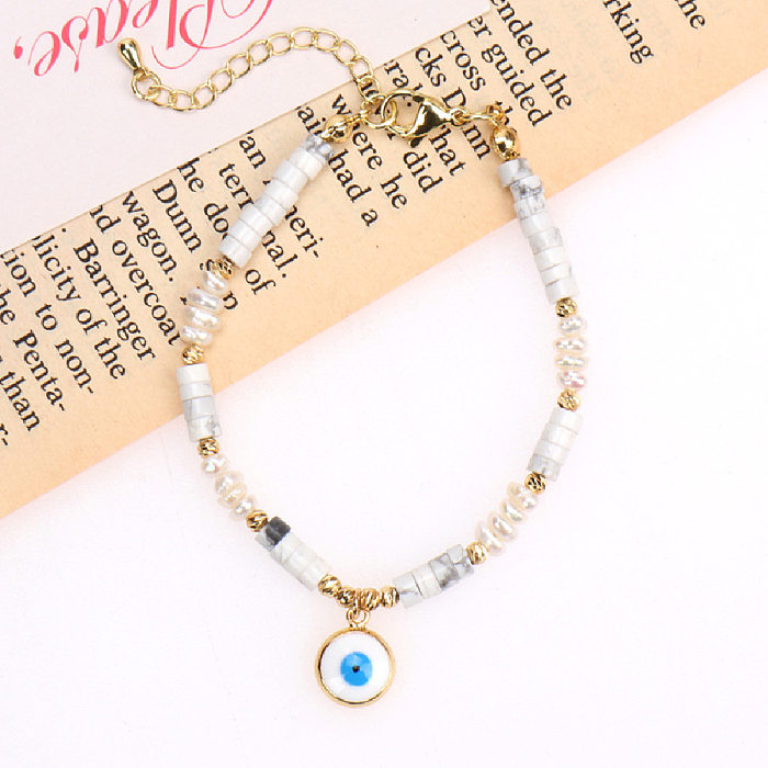 Nouveau Bracelet de perles d'eau douce personnalité oeil du diable goutte d'huile Bracelet en cuivre bijoux en gros