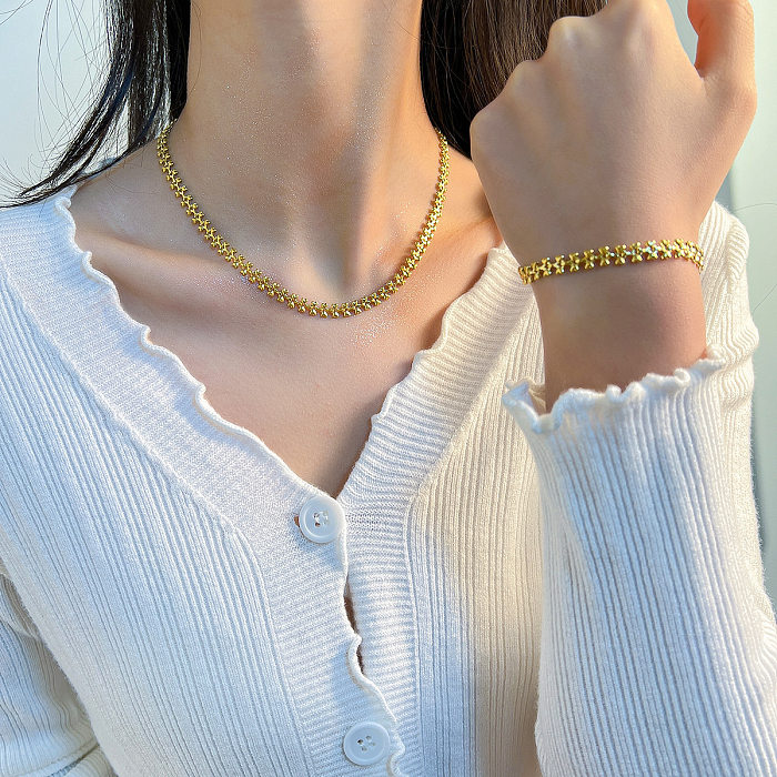 Einfache, klassische Halskette mit geometrischem Titanstahlüberzug und 18 Karat vergoldeten Armbändern