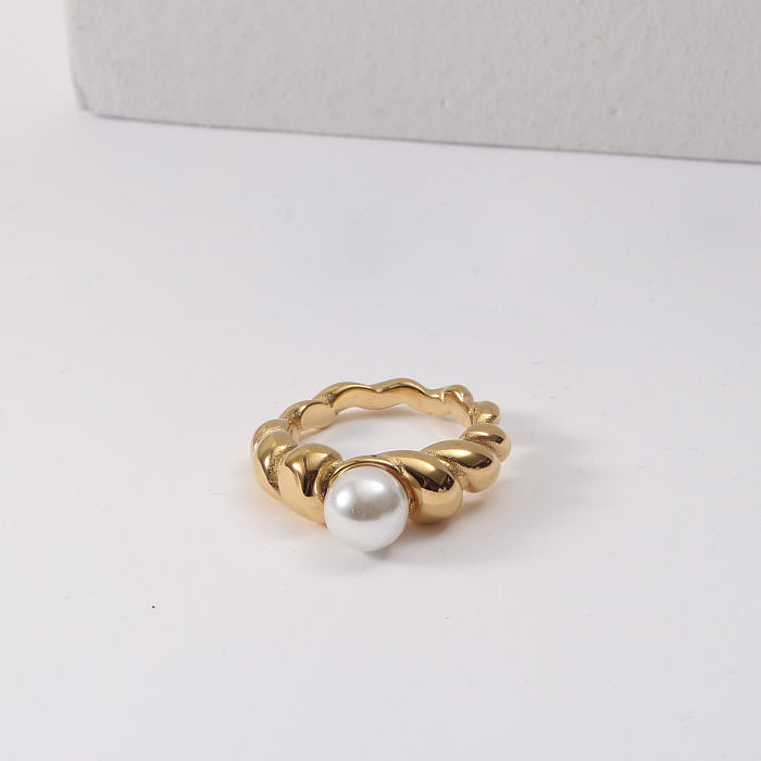 Retro-Twist-Ringe aus Titan mit Stahleinlage und künstlichen Perlen