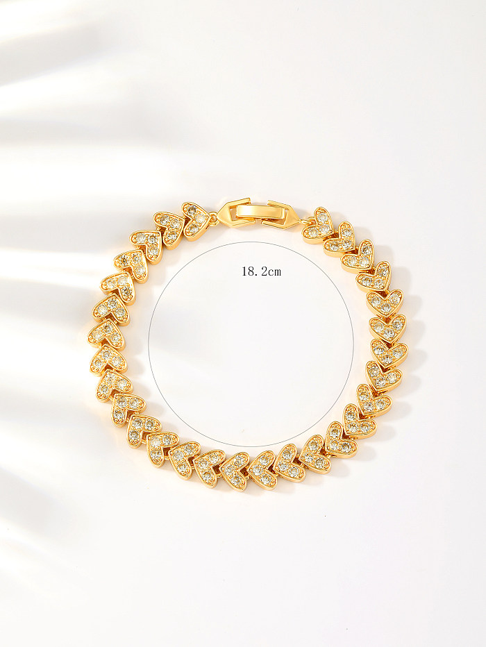 Bracelets plaqués or 18 carats avec incrustation de cuivre en forme de cœur brillant