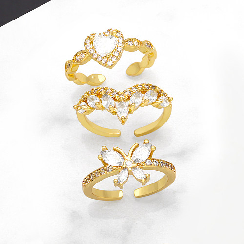 Süße, schlichte, herzförmige, schmetterlingsförmige, verkupferte offene Ringe mit Inlay aus Zirkon und 18 Karat Gold