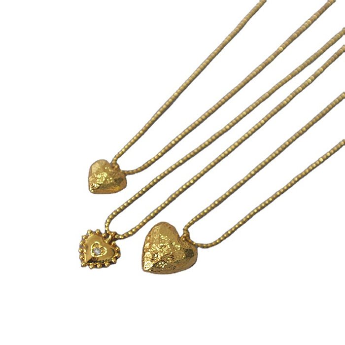 Einfache, moderne Anhänger-Halskette in Herzform mit Kupferbeschichtung und Inlay aus Zirkon, 18 Karat vergoldet