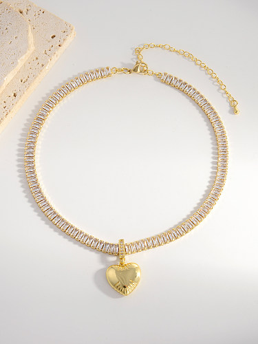 Collier pendentif plaqué or 18 carats avec incrustation de placage de cuivre rectangulaire en forme de cœur brillant