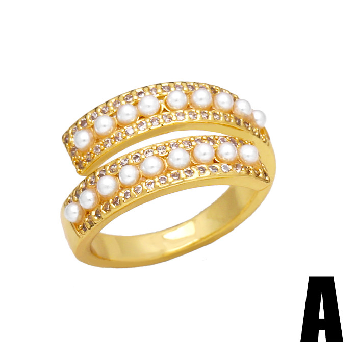 Schlichter Stil, rund, verkupfert, Inlay-Perlen, Zirkon, 18 Karat vergoldet, offene Ringe