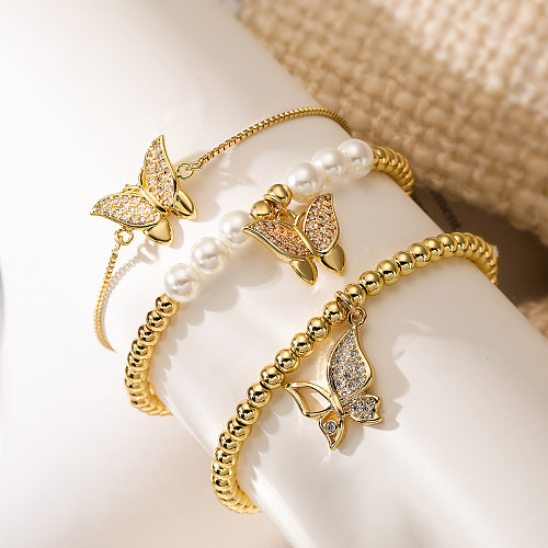 Schlichter Stil, Pendel-Schmetterlings-Imitat-Perlen-Verkupferungs-Inlay-Zirkon-Armbänder mit 18-Karat-Vergoldung