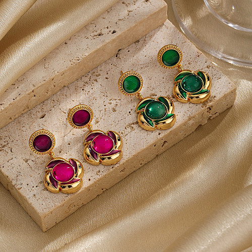 1 paire de boucles d'oreilles pendantes en verre de cuivre plaqué or 18 carats avec incrustation de fleur de style IG