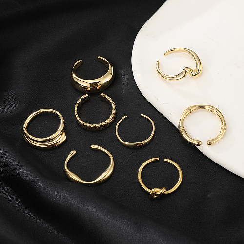 O ouro 18K de aço inoxidável do nó redondo do estilo simples chapeou anéis abertos