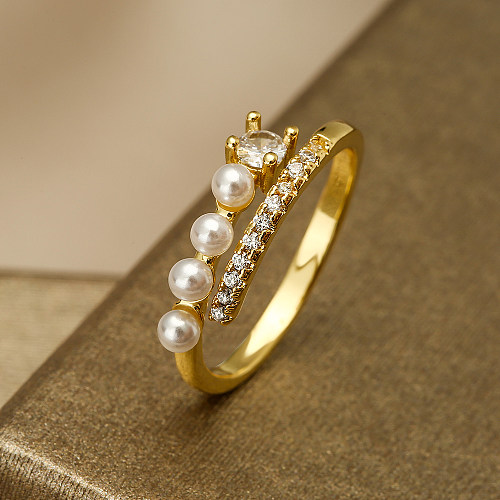 Offener Ring im einfachen Stil mit geometrischer Verkupferung, Intarsien, künstlichen Perlen, Zirkon, 18 Karat vergoldet