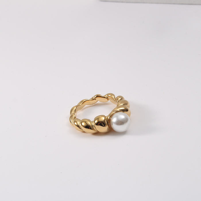 Retro-Twist-Ringe aus Titan mit Stahleinlage und künstlichen Perlen