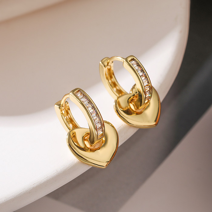 1 Paar einfacher Stil Pendel-Ohrringe in Herzform mit Inlay aus Kupfer und Zirkon, 18 Karat vergoldet