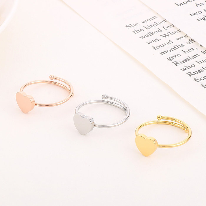 Anéis de chapeamento de aço de titânio em formato de coração de estilo simples