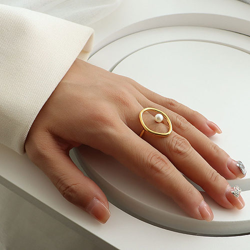 Schlichter Vintage-Ring aus Titanstahl mit geometrischer Perle