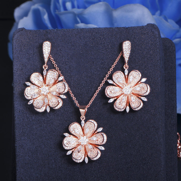 Collar de pendientes chapado en oro rosa con incrustaciones de cobre y flor romántica elegante