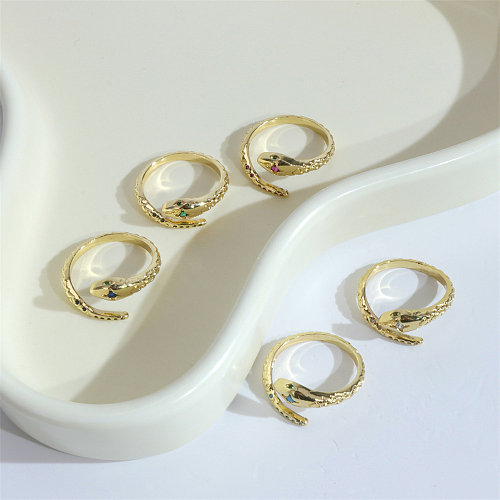 Offener Ring im INS-Stil mit Tierschlange, Kupferbeschichtung, Inlay, Zirkon, vergoldet