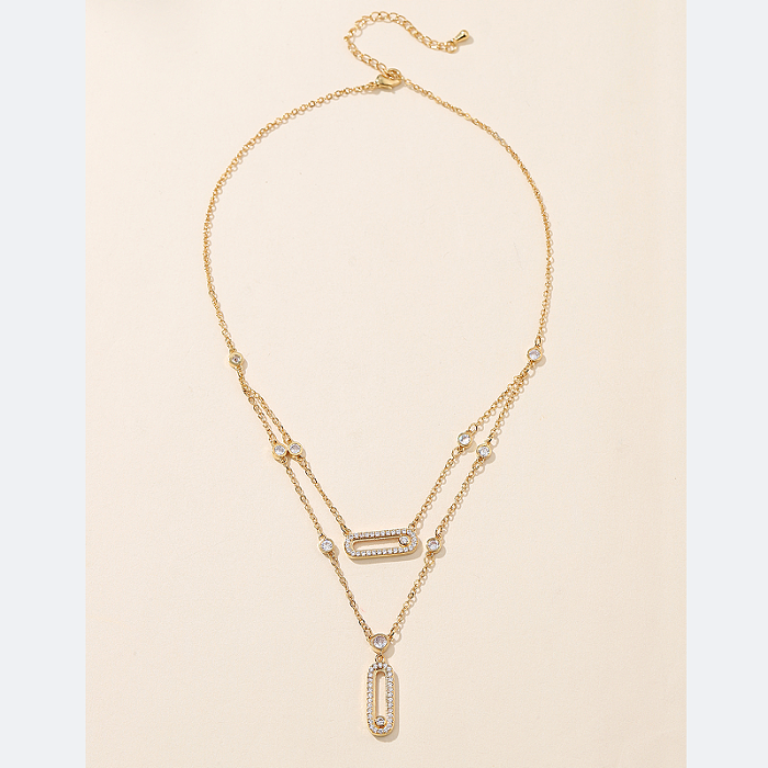 Elegante, schlichte, rechteckige Halskette mit 18-karätigem vergoldetem Zirkon-Anhänger mit geschichteter Kupferbeschichtung
