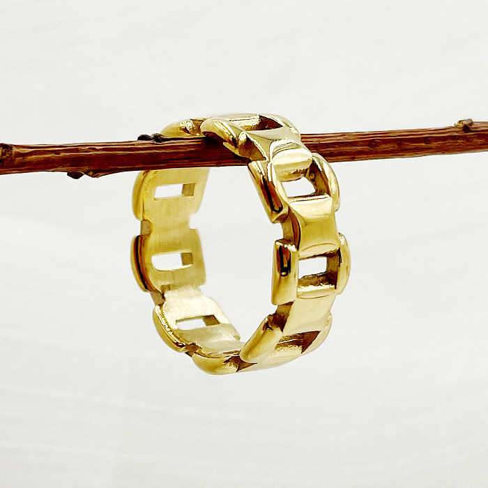 Cadenas de viaje de estilo moderno informal con estampado de acero inoxidable chapado en metal ahueca hacia fuera los anillos chapados en oro