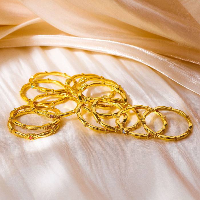 Schlichter Pendel-Stil, rund, verkupfert, Inlay, Geburtsstein, Zirkon, 18-karätig vergoldete Ringe