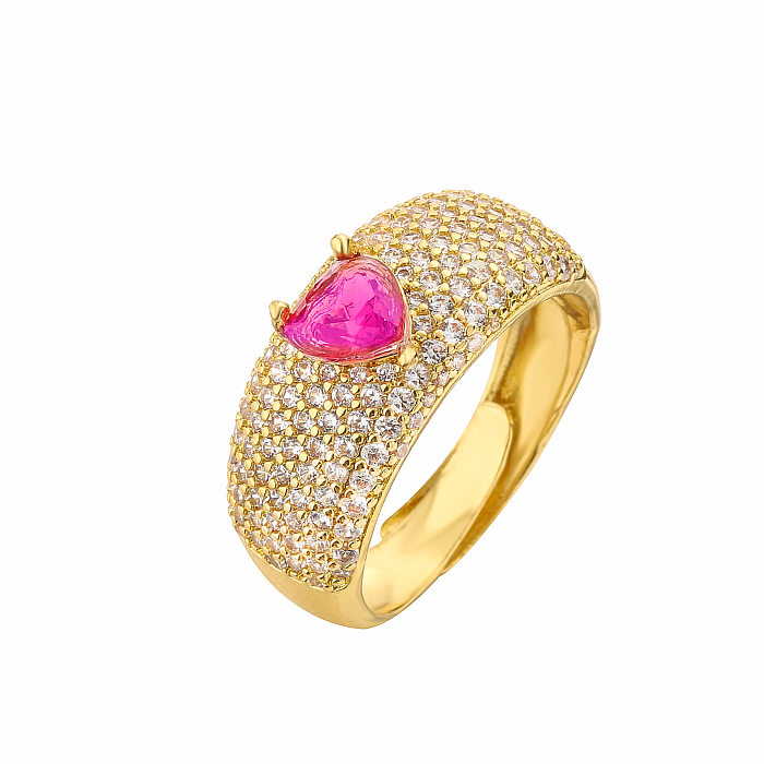 Pendientes de anillos de mujer con circonita chapada en oro de cobre con forma de corazón dulce