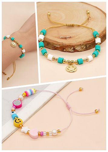 Bracelets de perles de cuivre en argile douce avec visage souriant de transport de style simple