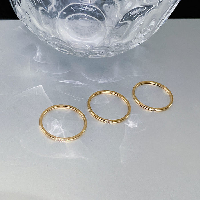 Modische runde Titan-Stahl-Inlay-Zirkon-Ringe, 1 Stück
