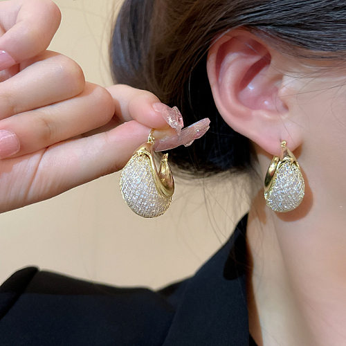 1 paire de boucles d'oreilles plaquées irrégulières en cuivre, couleur unie, Style Simple